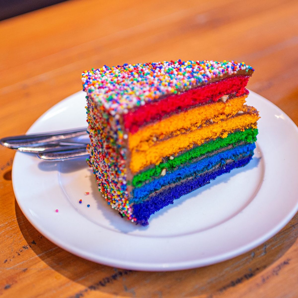 A generous slice of rainbow cake: a useful picture when planning how much cake you need